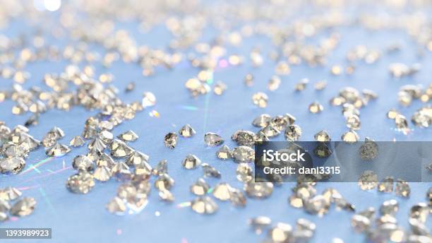 Loose Diamonds On Blue Background Stock Photo - Download Image Now - Diamond - Gemstone, Gemstone, Polishing