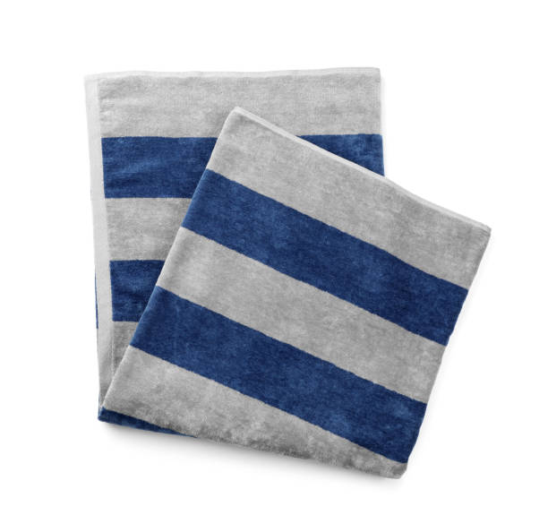 istock Folded striped beach towel isolated on white, top view 1393990585