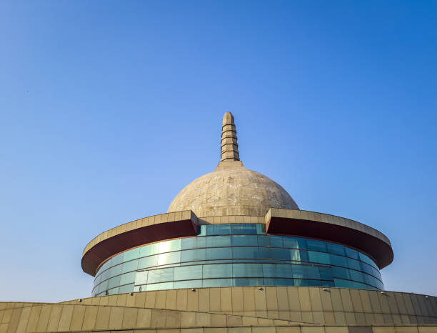 istock buddha stupa with bright blue sky at morning from low angle 1393991108