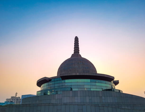 buddha stupa with bright colorful evening sky at dusk from different angle image is taken at buddha park patna bihar india on Apr 15 2022.