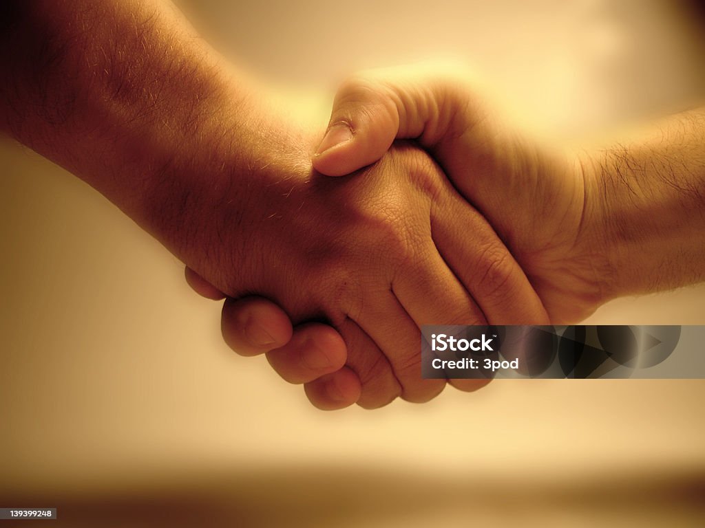 It's a deal! A handshake Business Relationship Stock Photo