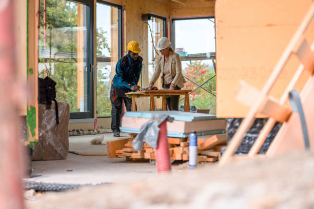 istock Project Leader And Businesswoman Meet At Construction Site 1393993440