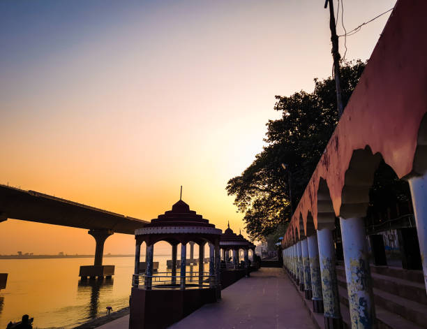 temple at ganges river shore at morning from flat angle - morning river ganges river varanasi imagens e fotografias de stock