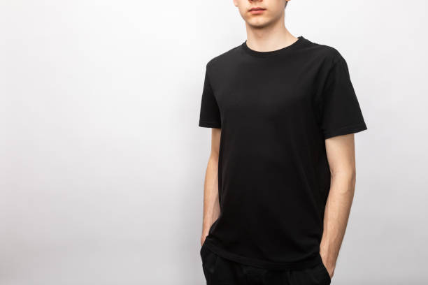 istock Blank black tshirt on teen studio shot on gray background 1393996640