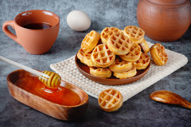 istock Breakfast with Belgian waffles, honey and coffee 1393997463