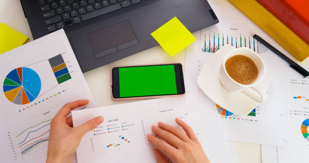 istock Smartphone with green screen, application for business 1393997634