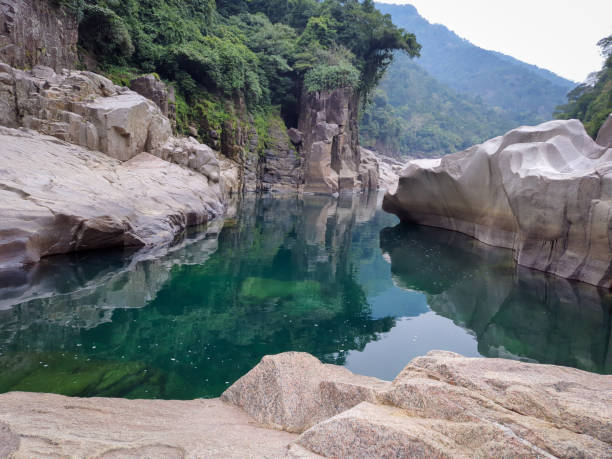 istock river water with naturally formed white shiny stone in unique shape at dry river bed at morning 1393997786