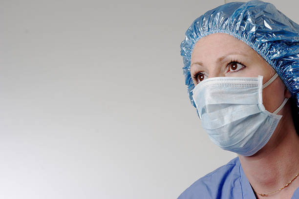 женский хирург - nurse hygiene emotional stress surgeon стоковые фото и изображения