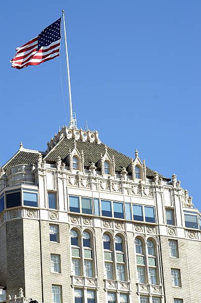 Flag flying atop the Mark Hopkins hotel SFO