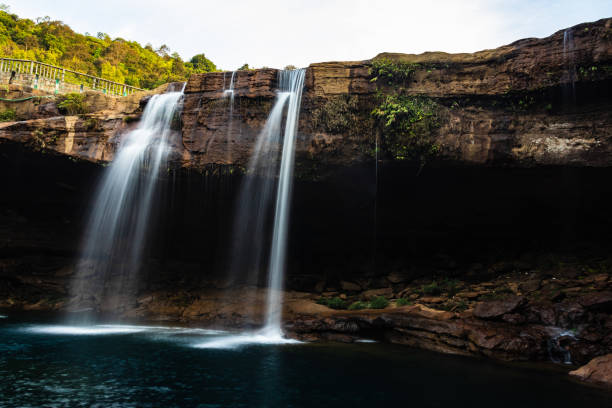 istock waterfall streams falling from mountain top at morning long exposure shot from different angle 1394000145
