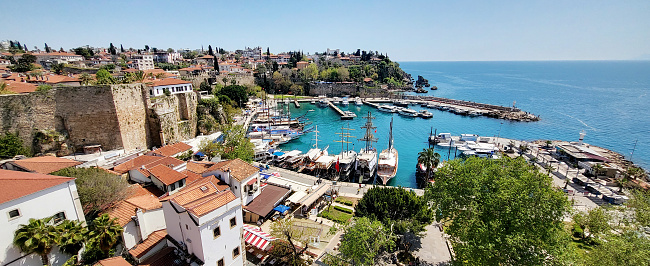 Ships, boats and yachts in the port of the Turkish city of Antalya