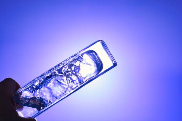 istock Liquids and bubbles in a blueback bottle 1394001708