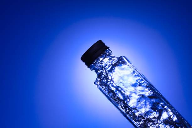 istock Liquids and bubbles in a blueback bottle 1394001718