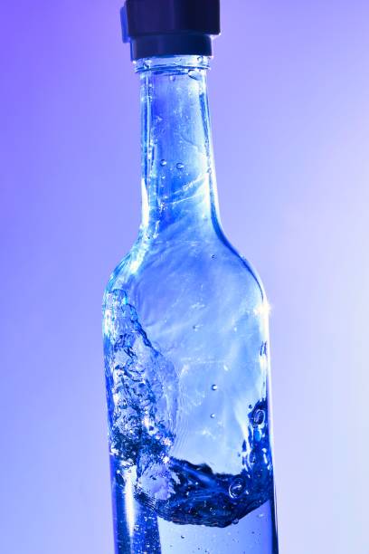 istock Liquids and bubbles in a blueback bottle 1394001722