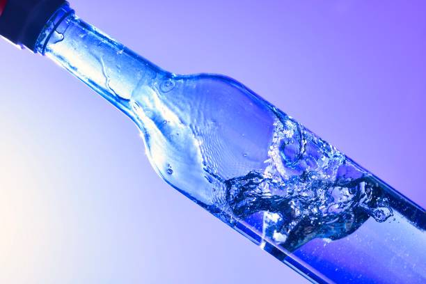 istock Liquids and bubbles in a blueback bottle 1394001759