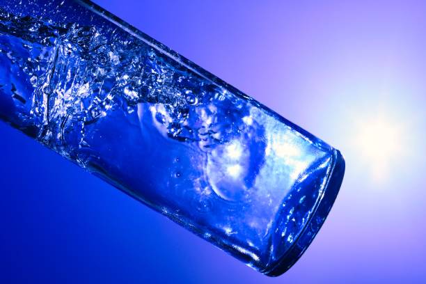 istock Liquids and bubbles in a blueback bottle 1394001844