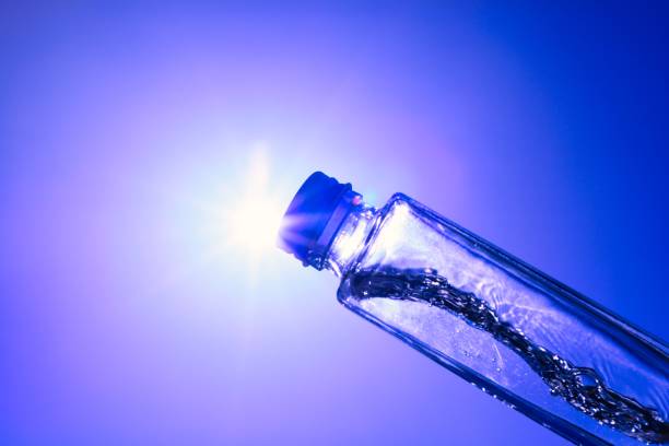 istock Liquids and bubbles in a blueback bottle 1394001866