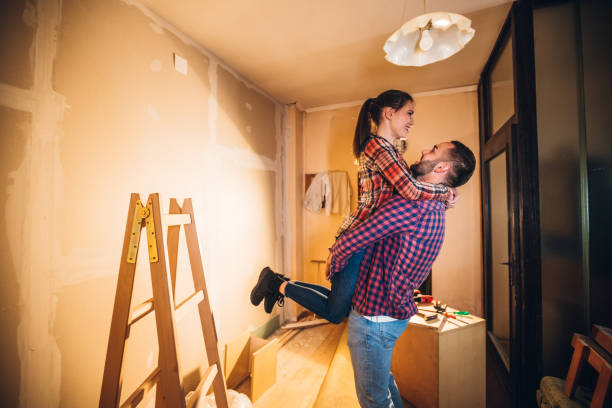 istock Young couple in new home 1394003741