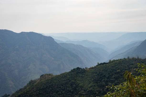 istock mountain valley covered with white mists and haze at morning from flat angle 1394004081