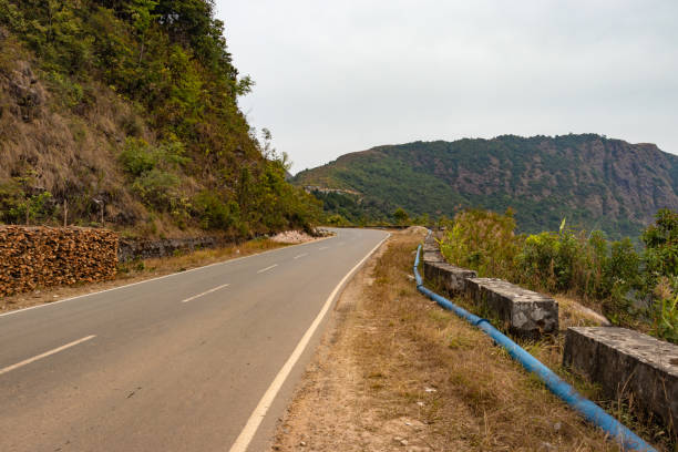 istock isolated mountain road with flat sky at morning from flat angle 1394004185