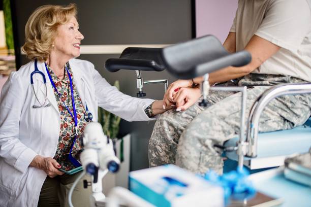 istock Unrecognizable soldier talking with female doctor 1394005012