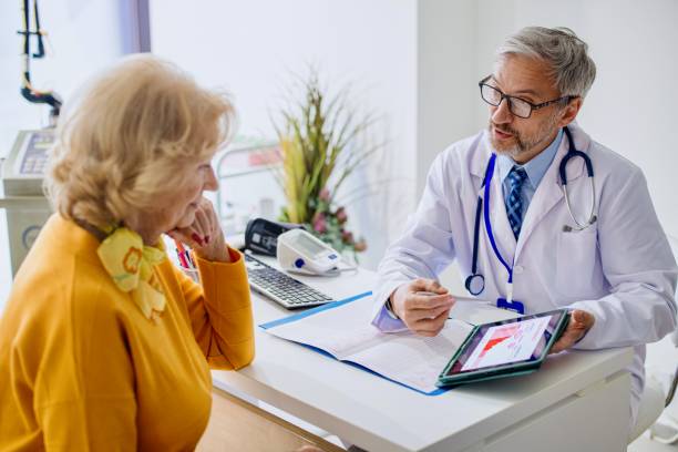 Doctor Explaining Hormone Replacement Therapy To His Patient Stock Photo -  Download Image Now - iStock