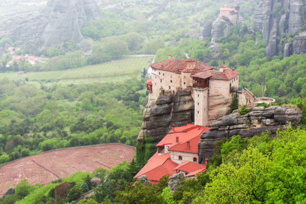 istock Meteora in Greece, monastery on the background of mountains, cloudy sky 1394015751