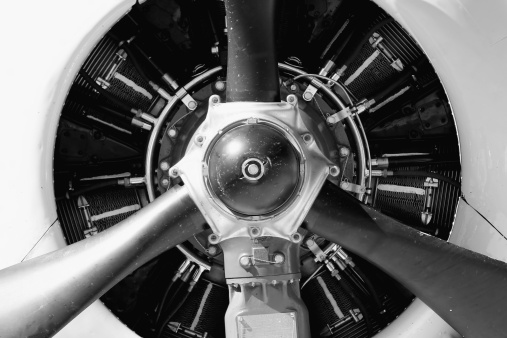 an old aircraft propeller engine, abstract frontal shot in highkey and converted to b&w