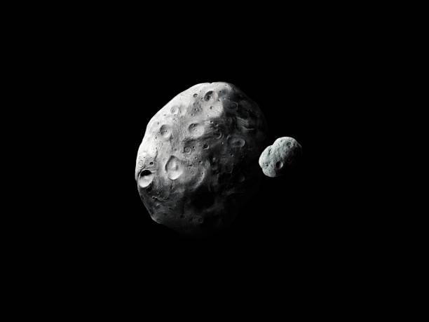 istock Asteroids in the solar system. Space rocks covered with craters. 1394016911