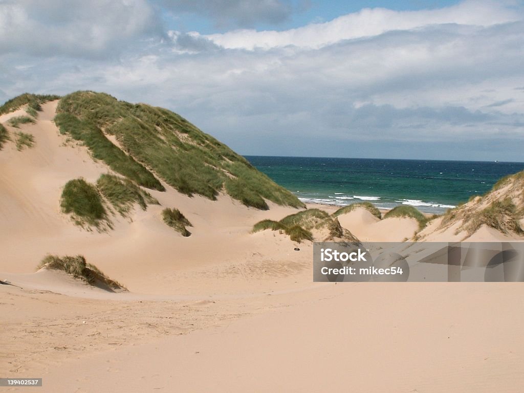 Rattray Dunes, Aberdeenshire, Scotland. Beneath these dunes lies a Royal Burgh! The small village of Rattray was given royal status by Queen Mary, but was subsequently buried in a storm. Royalty Stock Photo