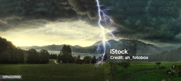 Thunderstorm With Lightning Strikes Over The Alps At Lake Attersee Salzburg Austria Concept For Insurance Damage Security Severe Weather And Climate Change Stock Photo - Download Image Now