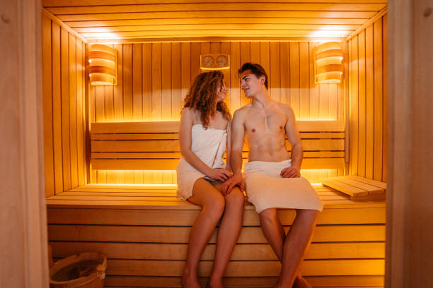 istock Young Couple Relaxing In Sauna 1394026883