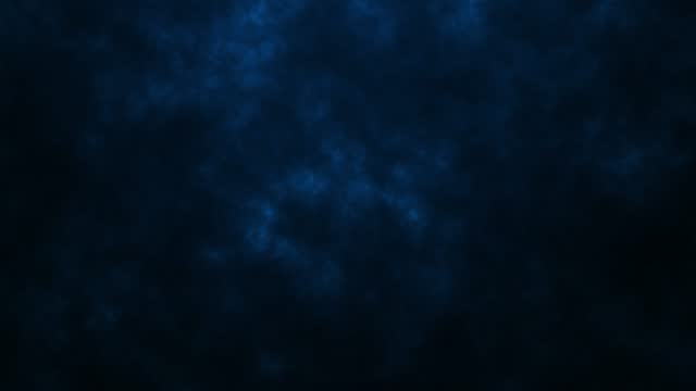 Smoke clears in the spotlight on dark background 4k