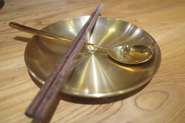istock Golden tableware on the table 1394030551