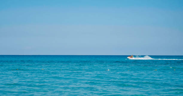 istock Water scooter movement on Mediterranean sea 1394030580
