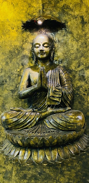 Metal curved picture of lord Buddha