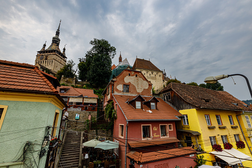 Sighișoara, Transilvania, Romania - August 24, 2021: The historic city of Sighisoara with the Stundturm in Transilvania Romania