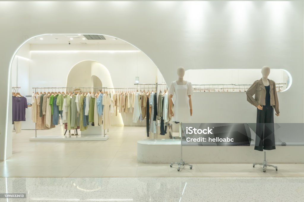 luxury fashion store front in modern shopping mall. Store Stock Photo
