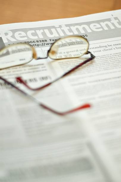 istock Reading glasses on a blurry newspaper 139403911