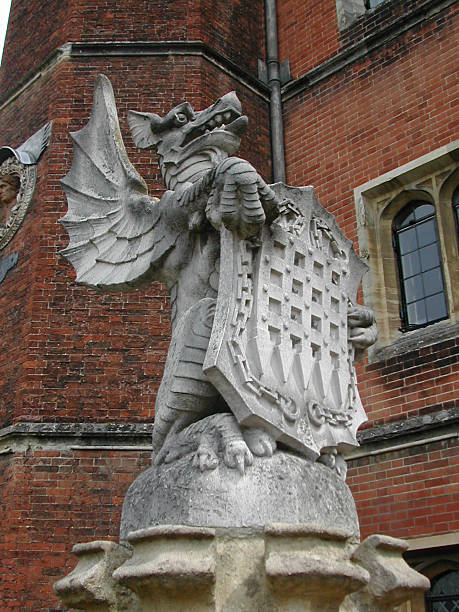 Hampton Court Dragon Dragon at the entrance of Hampton Court on the outskirts of London, UK. hampton court palace stock pictures, royalty-free photos & images