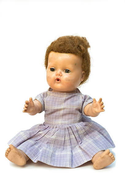 istock Old baby doll in dress 139404156