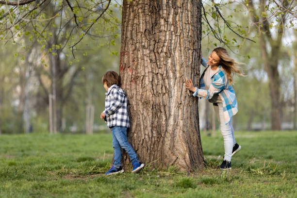 istock Mother playing hide and seek with son 1394043606