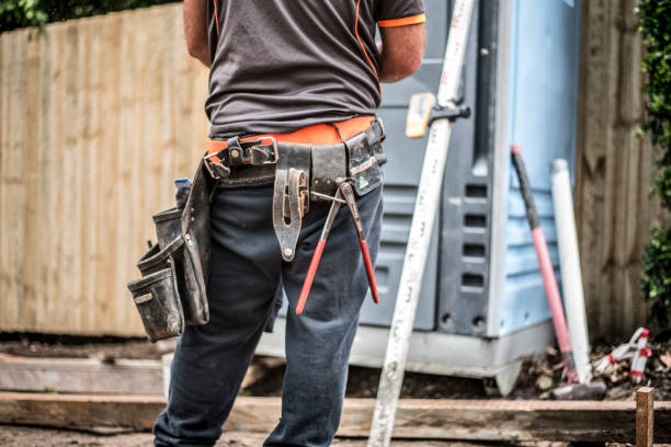 istock TradesMan Working in Driveway 1394048322
