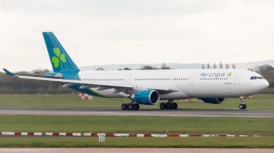 Manchester Airport, United Kingdom - 18 April, 2022: Aer Lingus Airbus A330 (G-EILA) departing.