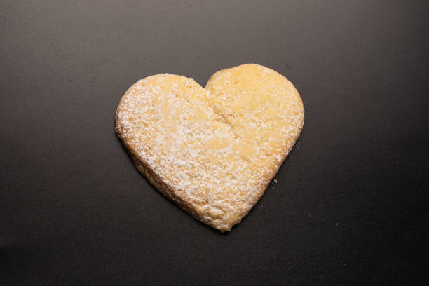 istock Shortbread in the shape of a heart isolated on white background. 1394052066