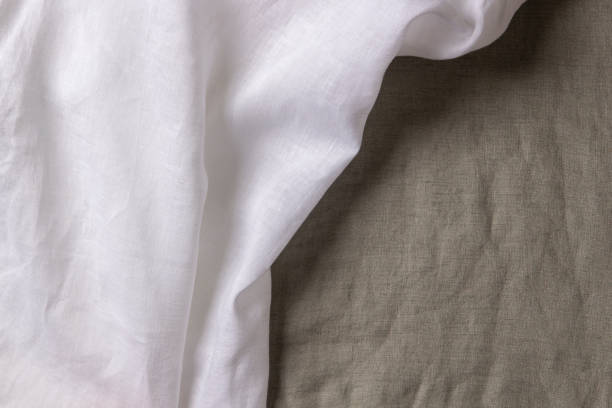 istock Abstract linen fabric texture background. Crumpled natural linen organic eco textiles canvas background. Top view 1394052095