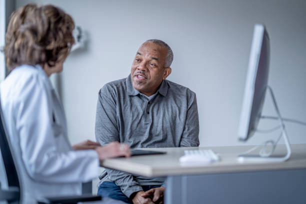 istock Senior Gentleman at a Doctors Appointment 1394053220
