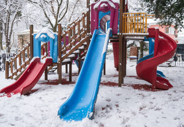 istock Children's playground covered with snow 1394055762