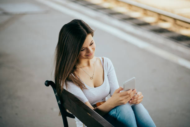 istock women waitintg on the train station in budapest 1394056955