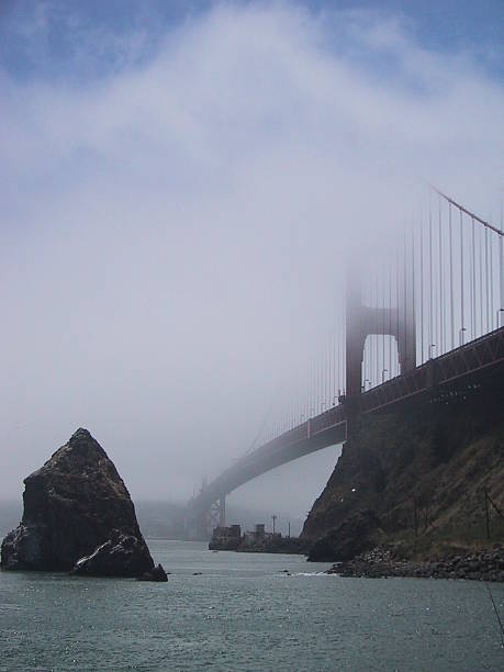 Golden Gate Bridge in fog, California, USA stock photo